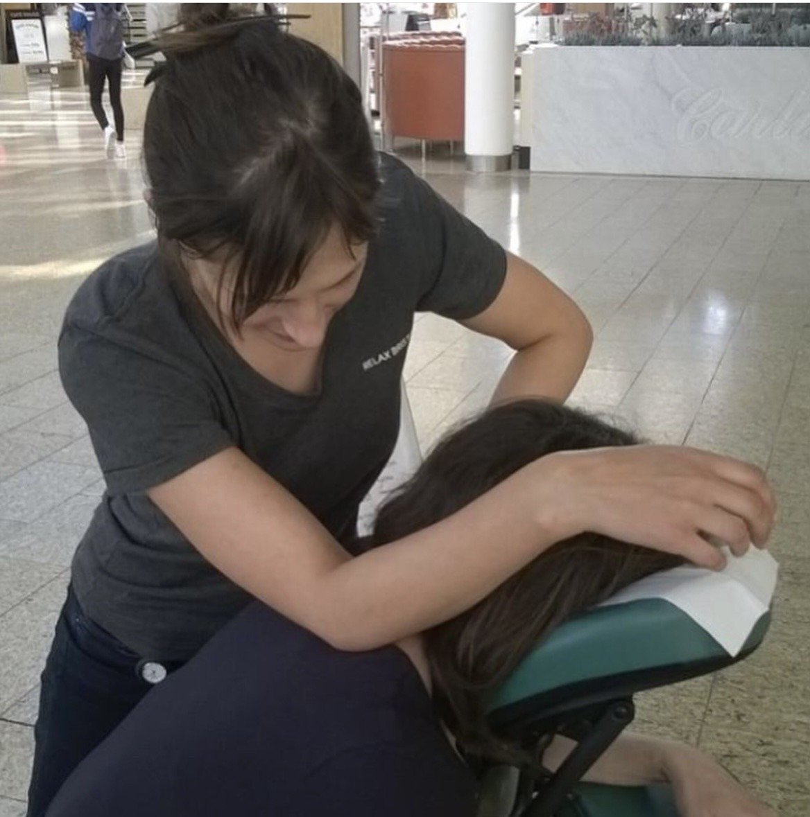 Relax Bristol giving massage to raise money for Changes Bristol