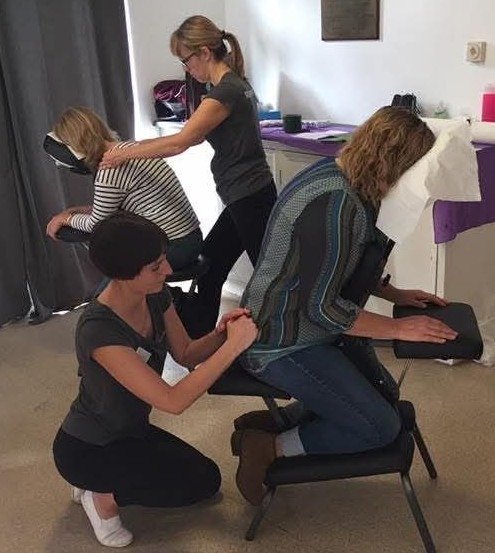 Relax Bristol therapists giving seated massage while working on location